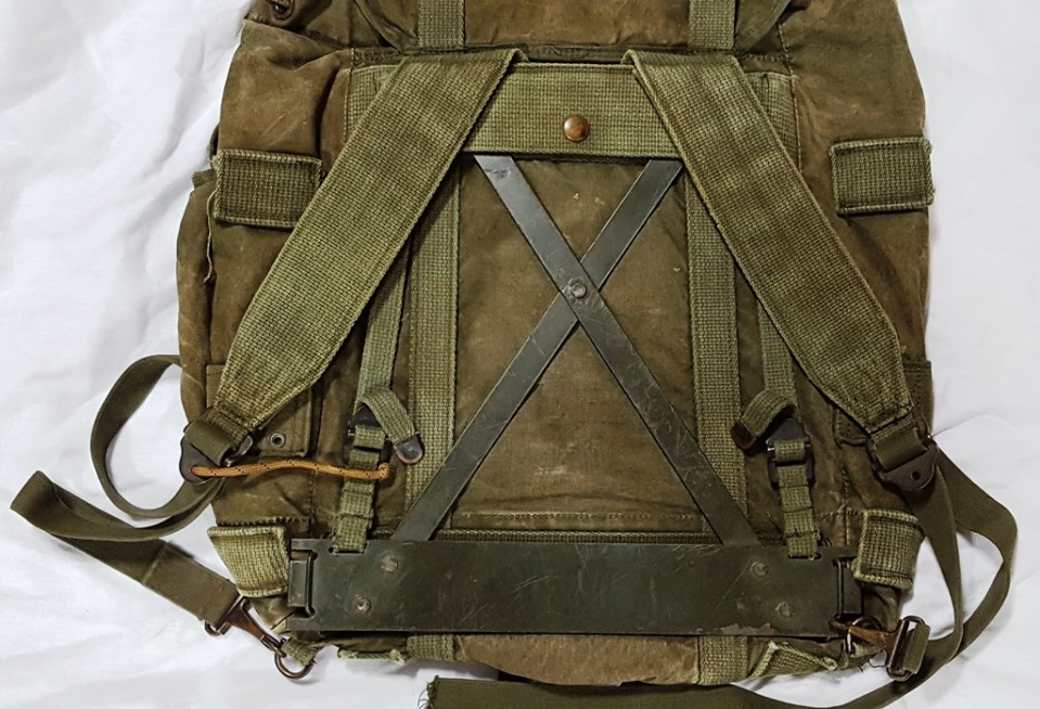 Arvn Rucksack. black kitchen with mermaid backsplash. 
